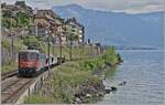The SBB Re 6/6 11626 (Re 620 026-5)  with mustache  is on its way towards Lausanne at St Saphorin..

May 19, 2025