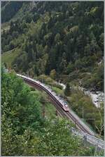 On the way on the Gotthard Railway - the journey of the IC 2 667 on the way from Basel SBB to Lugano , consisting of two SBB RABe 501  Twindexx  near Wassen in four pictures:
Coming from Pfaffensprung, the train reaches Wassen on the lowest level. 

Oct 19, 2023