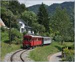 The RhB ABe 4/4 35 with the  Riviera-Belle-Epoque  Service on the way from Chaulin to Vevey by Blonay.