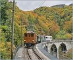 The Blonay Chamby Bernina Bahn Ge 4/4 81 with his train on the way to Blonay on the Baye de Clarnes Viadukt.