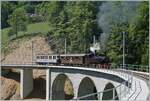The complex renovation work on the Baye de Clarens Viaduct has been completed. To withstand the constant pressure of the mountain, a pier on the Blonay side was designed so that the viaduct slides  flexibly  and only needs to be readjusted in 20 to 25 years.
Pictured here is the SEG G 2x 2/2 105 of the Blonay Chamby Railway on its way to Chaulin.
May 18, 2024