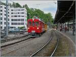 The Bernina Railway RhB Abe 4/4 35 of the Blonay Chamby Railway is waiting in Vevey with the RhB salon car as the  Riviera Belle Epoque  for departure to Chaulin.  
May 25, 2025