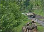 Swiss Steam Festival 2025 - Shortly after Vers Chez Robert, the legendary MOB DZe 6/6 2002 of the Blonay Chamby Railway appears. The baggage railcar is on its way to Chaulin with its museum train.

June 8, 2025