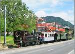 A Blonay Chamby steam train is arriving at Blonay.