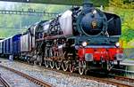 French steamer 241 A-65 calls at Interlaken ost with a special train on a very bad-weathered 14 May 2010.