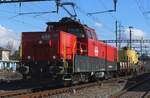 SBB 940 033 hauls a maintenance train through Pratteln on 13 February 2024.