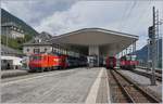 Change of the locomotives by the Glacier Express in Disentis: The MGB HGe 4/4 II N° 4 is now ready to deprature with his Glacier-Express to Zermatt and the RhB Ge 4/4 II 629 is waiting the