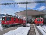 RhB Ge 4/4 II 633 and MGB HGe 4/4 II in Disentis.