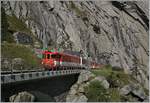 A MGB Deh 4/4 with a local train on the way from Göschenen to Andermatt on the way-out of the Schönenschlucht.