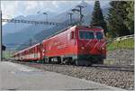 The MGB HGe 4/4 11 is leaving with his local service from Andermatt to Disentis from the Serdrun Station.