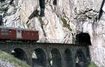 Deh 4/4 no 52 (FO) at Teufelsbrcke between Andermatt and Gschenen, August 12th, 1980.