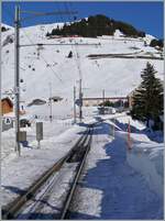A train searches for a picture: High above Anderamtt, two MGB  Orion  led by ABeh 8/12 310, are en route to Ursenental, far above Andermatt. The train is running as R 45 839 from Disentis (departure at 1:14 PM) to Andermatt (arriving at 2:22 PM).

January 21, 2025