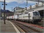 The Railcare Rem 476 454  Wallis  with a long Crgo Train on the way to Bern in Lausanne. 

08.05.2021