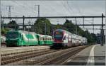 A BAM local train and a SBB RE in Morges.
03.07.2014