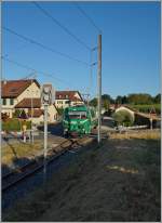 The BAM Ge 4/4 22 with the local train 105 in Vufflens-le-Château.