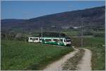 A BAM local train on the way to morges is arriving at Ballens.