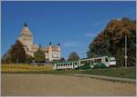 A BAM local train by the Castle of Vufflens.