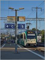 A BAM local train service is leaving Morges on the way to Bière.