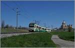 A BAM MBC local train on the way from Biere to Morges by tCastel of Vuffelns.