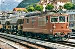 With a works train from the construction base of the Lötschberg Base Tunnel, BLS 179 enters Spiez on 22 July 2000.