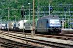 On 13 May 2010 BLS 465 010 hauls an intermodal toward Basel out of Brig station.