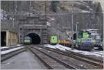 The BLS Re 465 002 (not to see) and the BLS R 465 017 with his AT1 to Kandersteg are entering in the Lötschberg-Tunnel in Goppenstein.