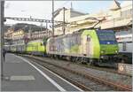 The BLS Re 485 001 and BLS Re 465 014 are traveling with a sugar beet train and are waiting in Lausanne for the blocking distance to the IR 90 in front.