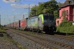BLS 475 410 hauls an intermodal train through Lintorf on 8 May 2025.