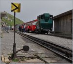 The BRB H 2/3 N° 14 at the sumit Station Brinezer Rothorn.