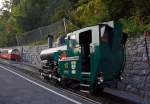 The heating oil-fired locomotive travels BRB 15 on 30.09.2011 (18:45 h) in the station Brienz (BRB).
