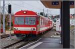 A CJ local train is arriving at Le Noirmont.