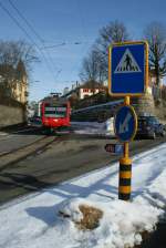 The first miles from la Chaux de Fonds to the Jura runs the CJ trains in the street from the City of la Chaux-de-Fonds.