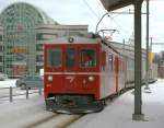 The CJ Bef 4/4 641 (ex RhB ABe 4/4 641) is arriving in La Chaux-de-Fonds. 
16.02.2010