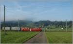 The ex RhB  Arosabahn  ABe 4/4 on the way to Le Noiremont by La Cibourg. 
11.10.2011