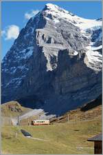 A Jungfraubahn Sercie Train by the Eigergletscher Station in the Background the Eiger Nord Wand.
