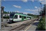 The LEB RBe 4/8 49 and a Be 4/8 by his stop in Jouxtens-Mézery.