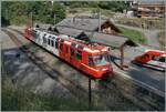 The TMR BDe 4/8 21 is on its way from Vallorcine to Martigny and was photographed during the stop at Les Marécottes.