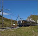 The Rochers de Naye Beh 4/8 301 is leaving the sumit Station.
04.09.2014