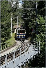 The Rochers de Naye Bhe 4/8 301 and an other one on the way to Montreux near Le Tremplex.