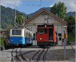 The Bhe 2/4 207 and  the  Hme 2/2 11 by the Glion Depot.