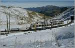 Is arriving on the Rochers de Naye summit Station: The MGN (Golden Pass groupe) BDeh 4/8 304.