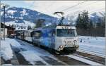 The MOB Ge 4/4 Serie 8000 with his Fast-Train-Service 3123 is arriving at Saanen. 
03.02.2014