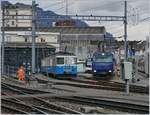 The MOB ABDe 8/8 4003 Fribourg and a Ge 4/4 in Montreux.