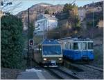 The MOB ABDe 8/8 4003 BERN and the loacal train 2214 in Fontanivent.