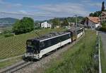 The MOB GDe 4/4 6005 with a PE 2111 from Zweisimmen to Montreux by Planchamp.