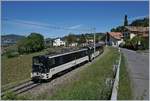 The MOB Ge 4/4 6005 with a MOB Panoramic Express on the way to Zweisimmen by Planchamp.