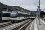 The MOB Be 4/4 1007 (ex Bipperlisi) in the background and the Alpina Abe 4/4 9304 in Zweisimmen.