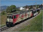 The MOB Ge 4/4 6006 with a MOB Panoramic Express on the way from Zweisimmen to Montreux by Planchamp.