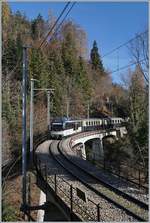 The MOB Alina ABe 4/4 9301 and a Be 4/4 with the MOB Belle Epoque Service on the way to Montreux near Sendy-Sollard.