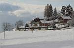 The MOB GDe 4/4 6005 with a MOB Panoramic on the way to Zweisimmen by Les Avants.